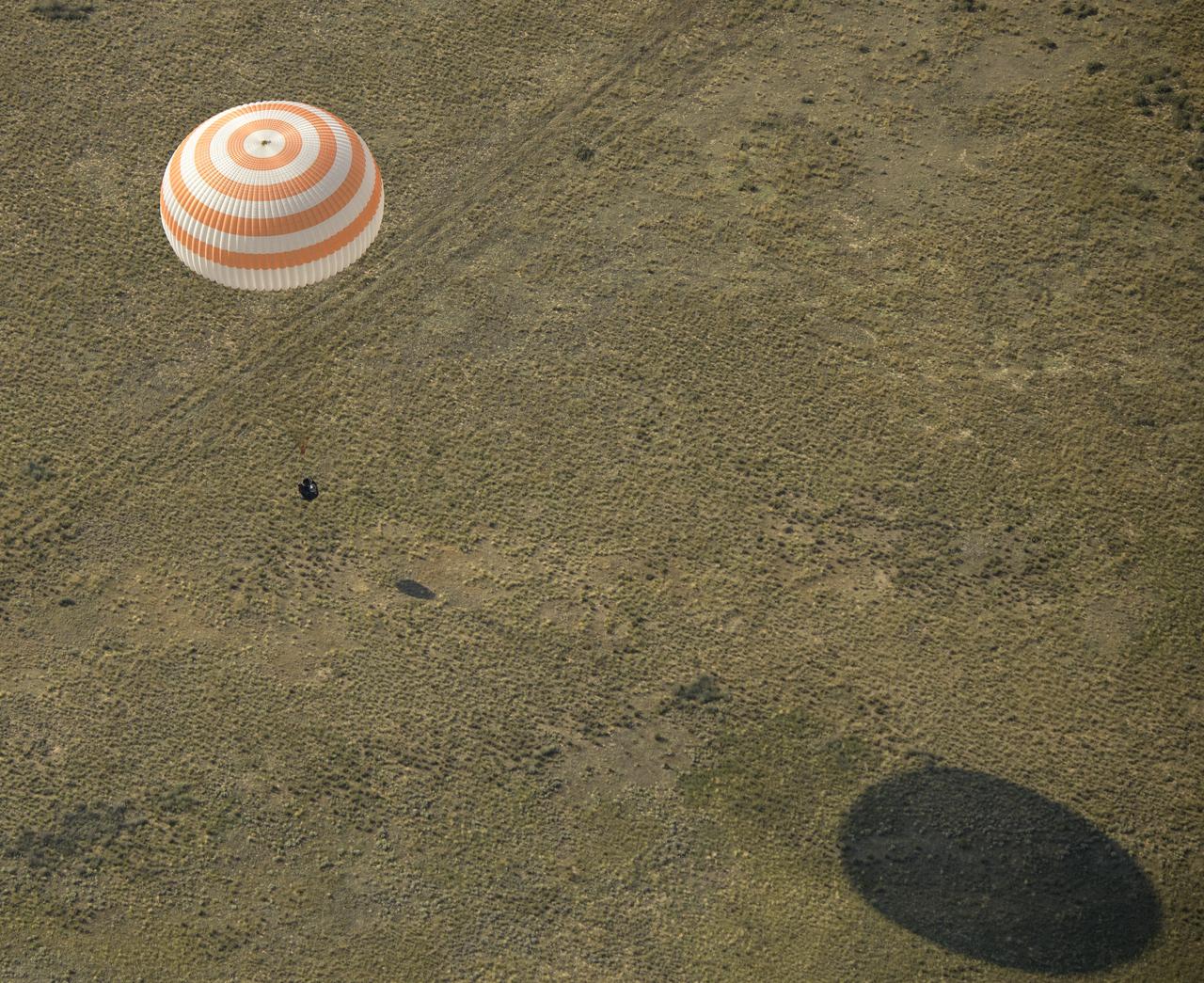 The Soyuz MS-11 spacecraft is seen as it lands in a remote area near the town of Zhezkazgan, Kazakhstan with Expedition 59 crew members Anne McClain of NASA, David Saint-Jacques of the Canadian Space Agency, and Oleg Kononenko of Roscosmos, Tuesday, June 25, 2019 Kazakh time (June 24 Eastern time). McClain, Saint-Jacques, and Kononenko are returning after 204 days in space where they served as members of the Expedition 58 and 59 crews onboard the International Space Station. Photo Credit: (NASA/Bill Ingalls)