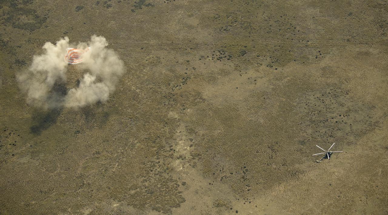 The Soyuz MS-11 spacecraft is seen as it lands in a remote area near the town of Zhezkazgan, Kazakhstan with Expedition 59 crew members Anne McClain of NASA, David Saint-Jacques of the Canadian Space Agency, and Oleg Kononenko of Roscosmos, Tuesday, June 25, 2019 Kazakh time (June 24 Eastern time). McClain, Saint-Jacques, and Kononenko are returning after 204 days in space where they served as members of the Expedition 58 and 59 crews onboard the International Space Station. Photo Credit: (NASA/Bill Ingalls)