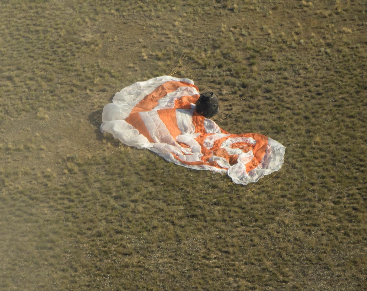 The Soyuz MS-11 spacecraft is seen after it landed in a remote area near the town of Zhezkazgan, Kazakhstan with Expedition 59 crew members Anne McClain of NASA, David Saint-Jacques of the Canadian Space Agency, and Oleg Kononenko of Roscosmos, Tuesday, June 25, 2019 Kazakh time (June 24 Eastern time). McClain, Saint-Jacques, and Kononenko are returning after 204 days in space where they served as members of the Expedition 58 and 59 crews onboard the International Space Station. Photo Credit: (NASA/Bill Ingalls)