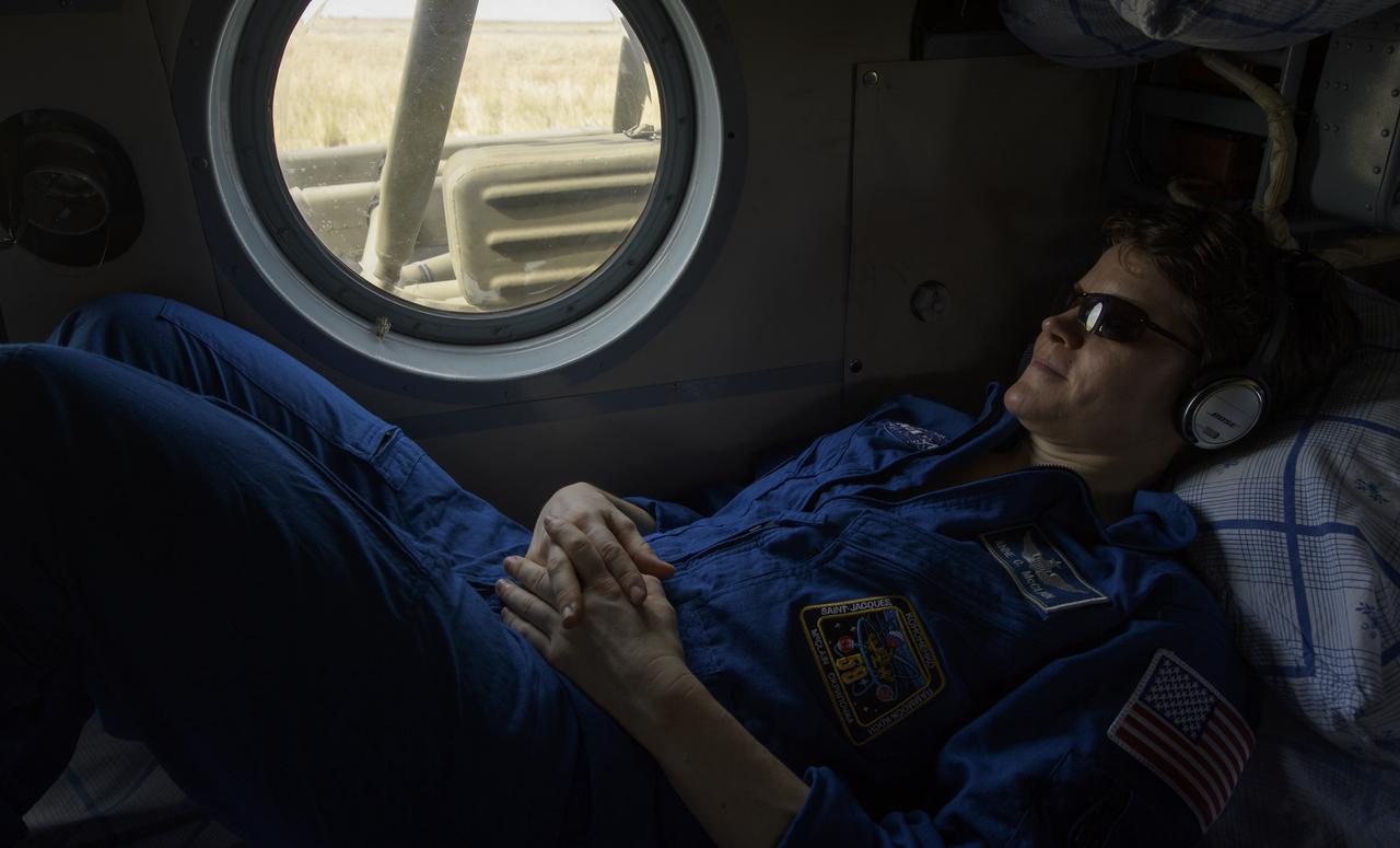 Expedition 59 NASA astronaut Anne McClain departs the Soyuz MS-11 spacecraft landing site via helicopter shortly after she, Canadian Space Agency astronaut David Saint-Jacques, and Roscosmos cosmonaut Oleg Kononenko landed in their Soyuz MS-11 spacecraft near the town of Zhezkazgan, Kazakhstan, Tuesday, June 25, 2019. McClain, Saint-Jacques, and Kononenko are returning after 204 days in space where they served as members of the Expedition 58 and 59 crews onboard the International Space Station. Photo Credit: (NASA/Bill Ingalls)