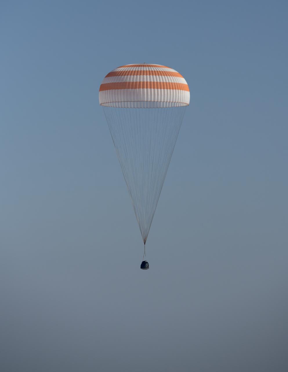 The Soyuz MS-11 spacecraft is seen as it lands in a remote area near the town of Zhezkazgan, Kazakhstan with Expedition 59 crew members Anne McClain of NASA, David Saint-Jacques of the Canadian Space Agency, and Oleg Kononenko of Roscosmos, Tuesday, June 25, 2019 Kazakh time (June 24 Eastern time). McClain, Saint-Jacques, and Kononenko are returning after 204 days in space where they served as members of the Expedition 58 and 59 crews onboard the International Space Station. Photo Credit: (NASA/Bill Ingalls)
