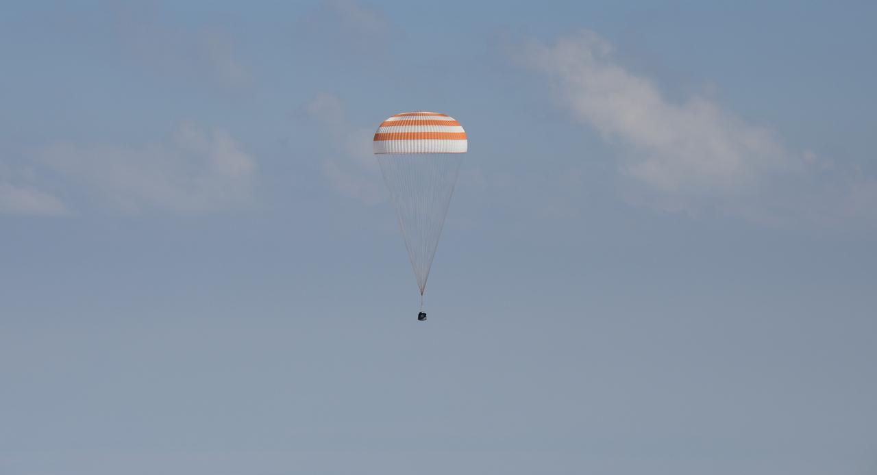 The Soyuz MS-11 spacecraft is seen as it lands in a remote area near the town of Zhezkazgan, Kazakhstan with Expedition 59 crew members Anne McClain of NASA, David Saint-Jacques of the Canadian Space Agency, and Oleg Kononenko of Roscosmos, Tuesday, June 25, 2019 Kazakh time (June 24 Eastern time). McClain, Saint-Jacques, and Kononenko are returning after 204 days in space where they served as members of the Expedition 58 and 59 crews onboard the International Space Station. Photo Credit: (NASA/Bill Ingalls)