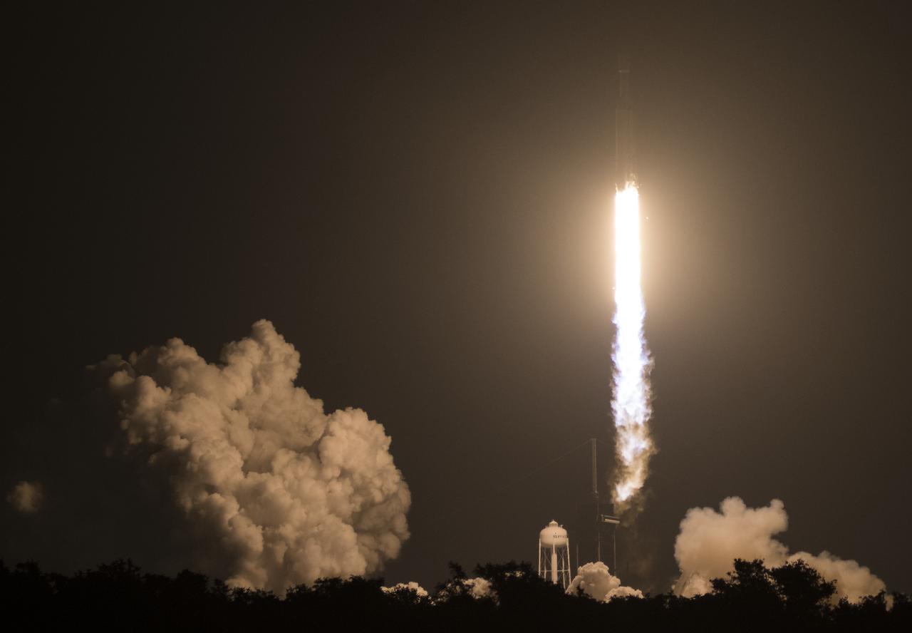 A SpaceX Falcon Heavy rocket carrying 24 satellites as part of the Department of Defense's Space Test Program-2 (STP-2) mission launches from Launch Complex 39A, Tuesday, June 25, 2019 at NASA's Kennedy Space Center in Florida. Four NASA technology and science payloads which will study non-toxic spacecraft fuel, deep space navigation, "bubbles" in the electrically-charged layers of Earth's upper atmosphere, and radiation protection for satellites are among the two dozen satellites that will be put into orbit. Photo Credit: (NASA/Joel Kowsky)