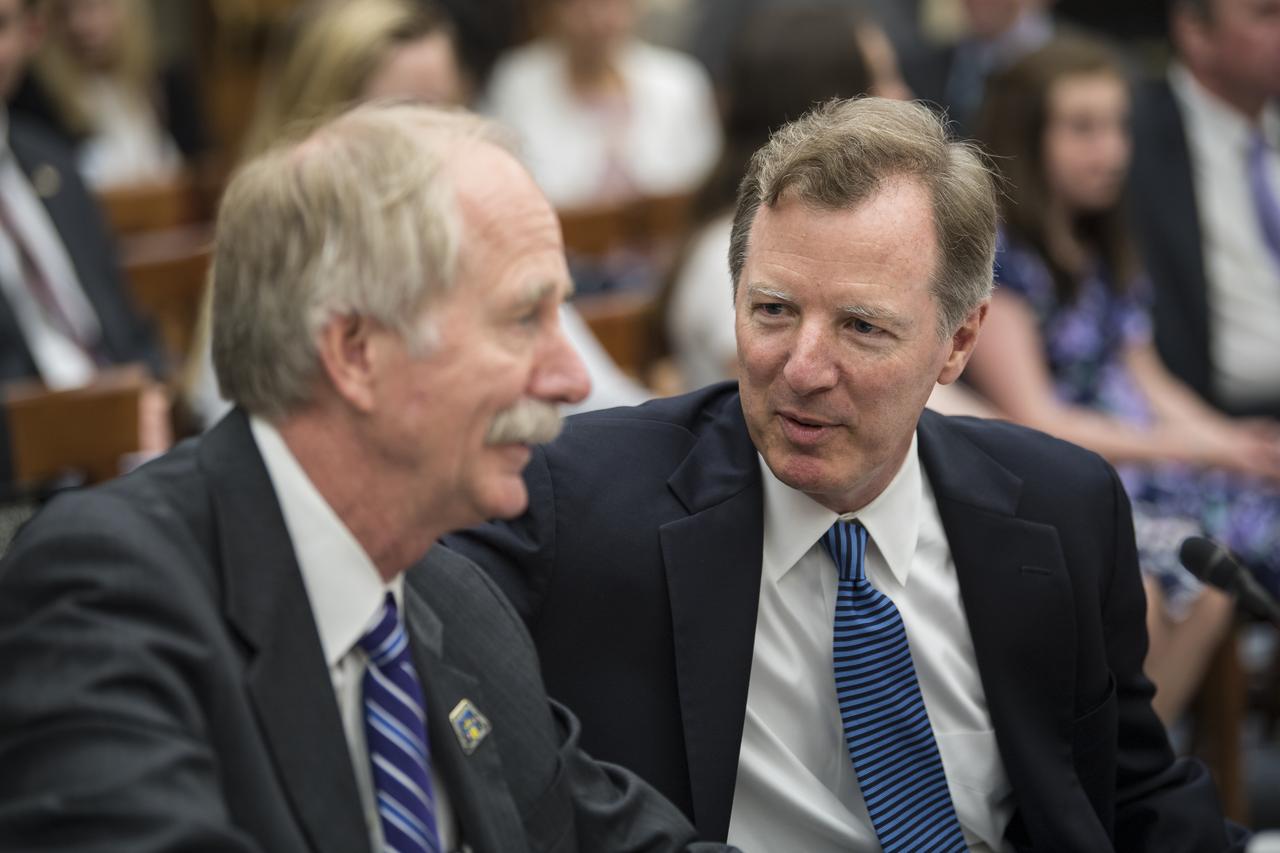 The Honorable Paul Martin, inspector general, NASA, speaks to Bill Gerstenmaier, associate administrator, Human Exploration and Operations, NASA, before they testify during a Space and Aeronautics Subcommittee of the House Science, Space, and Technology Committee hearing titled, “A Review of NASA’s Plans for the International Space Station and Future Activities in Low Earth Orbit," Wednesday, July 10, 2019 at the Rayburn House Office Building in Washington. Photo Credit: (NASA/Aubrey Gemignani)