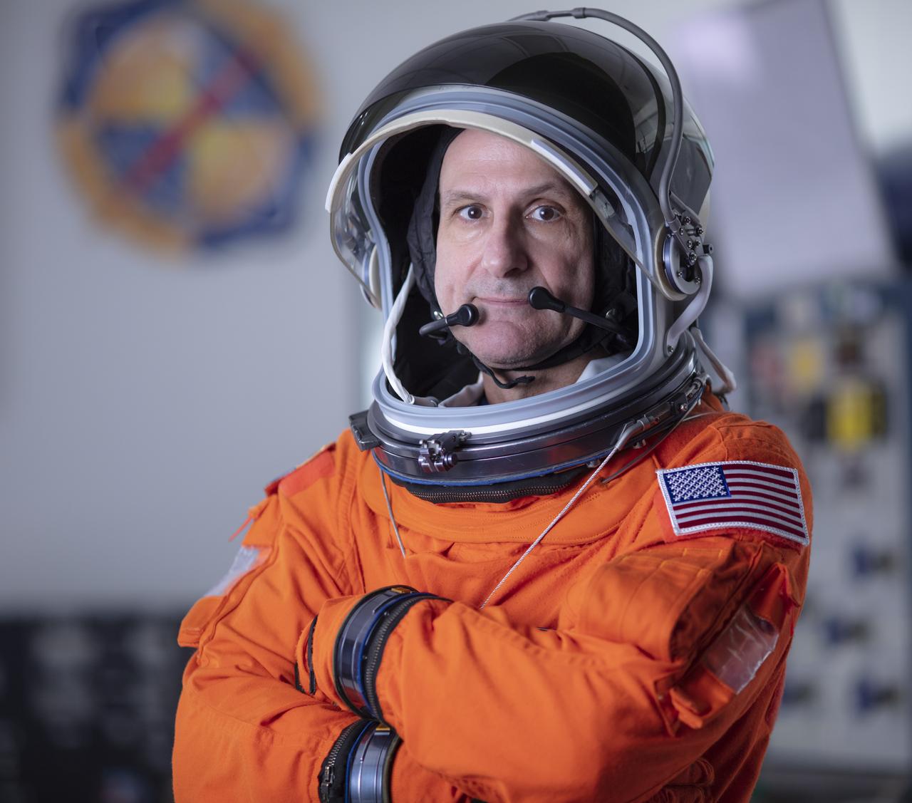 NASA astronaut Don Pettit poses for a portrait after donning his spacesuit, Friday, July 12, 2019 at NASA's Johnson Space Center in Houston, Texas. Photo Credit: (NASA/Bill Ingalls)