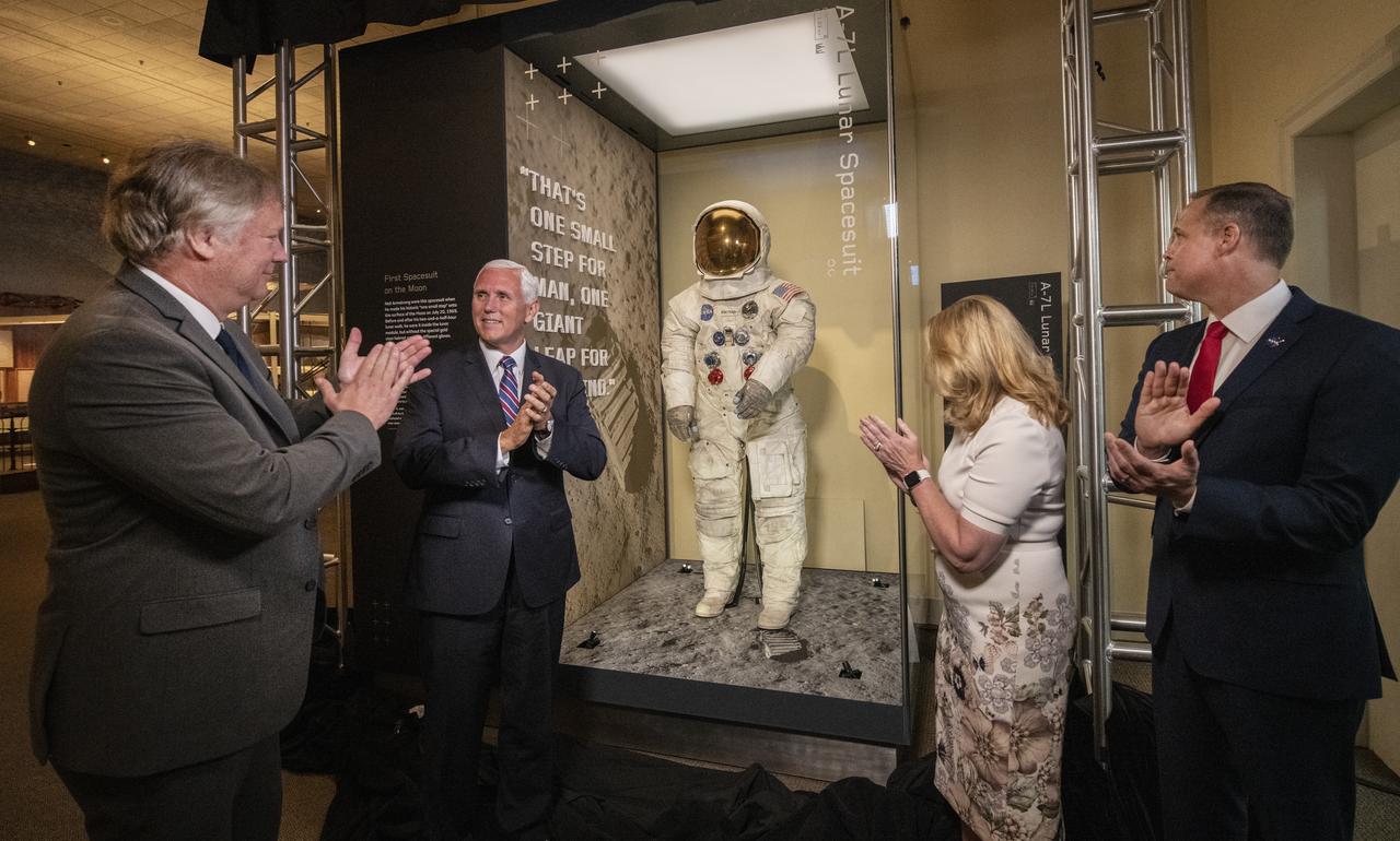 In celebration of the 50th anniversary of Apollo 11, NASA Astronaut Neil Armstrong's spacesuit was unveiled today in The Wright Brothers and The Invention of the Aerial Age Gallery of the Smithsonian Air and Space Museum, in Washington, DC, July 16, 2019. Unveiling the spacesuit, from left, Rick Armstrong, son of Neil Armstrong, Vice President Mike Pence, Dr. Ellen Stofan, The John and Adrienne Mars Director of the National Air and Space Museum, and James Bridenstine, Administrator of NASA.  (Smithsonian Air and Space photo by Jim Preston)