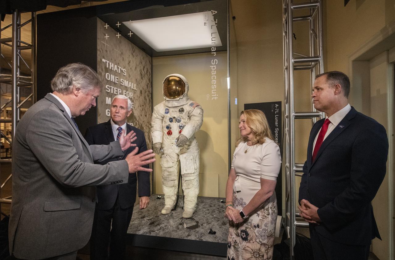 In celebration of the 50th anniversary of Apollo 11, NASA Astronaut Neil Armstrong's spacesuit was unveiled today in The Wright Brothers and The Invention of the Aerial Age Gallery of the Smithsonian Air and Space Museum, in Washington, DC, July 16, 2019. Unveiling the spacesuit, from left, Rick Armstrong, son of Neil Armstrong, Vice President Mike Pence, Dr. Ellen Stofan, The John and Adrienne Mars Director of the National Air and Space Museum, and James Bridenstine, Administrator of NASA.  (Smithsonian Air and Space photo by Jim Preston)