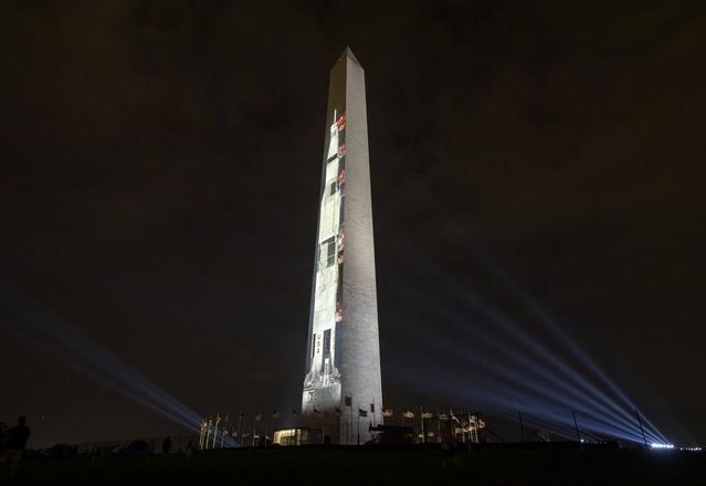 NASA image: Apollo 11 Saturn V Rocket Projected On The Washington Monument
