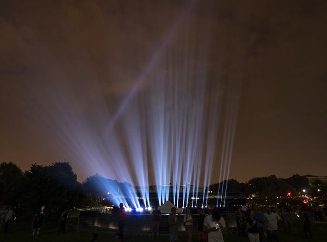 NASA image: Apollo 11 Saturn V Rocket Projected On The Washington Monument