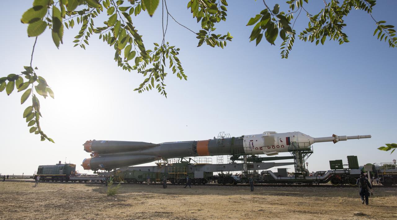 The Soyuz rocket is seen as it is rolled out of Building 112, Thursday, July 18, 2019 at the Baikonur Cosmodrome in Kazakhstan. Expedition 60 Soyuz Commander Alexander Skvortsov of Roscosmos, flight engineer Andrew Morgan of NASA, and flight engineer Luca Parmitano of ESA (European Space Agency) are scheduled to launch aboard their Soyuz MS-13 spacecraft at 12:28 p.m. Eastern time (9:28 p.m. Baikonur time) , on Saturday, July 20. Photo Credit: (NASA/Joel Kowsky)