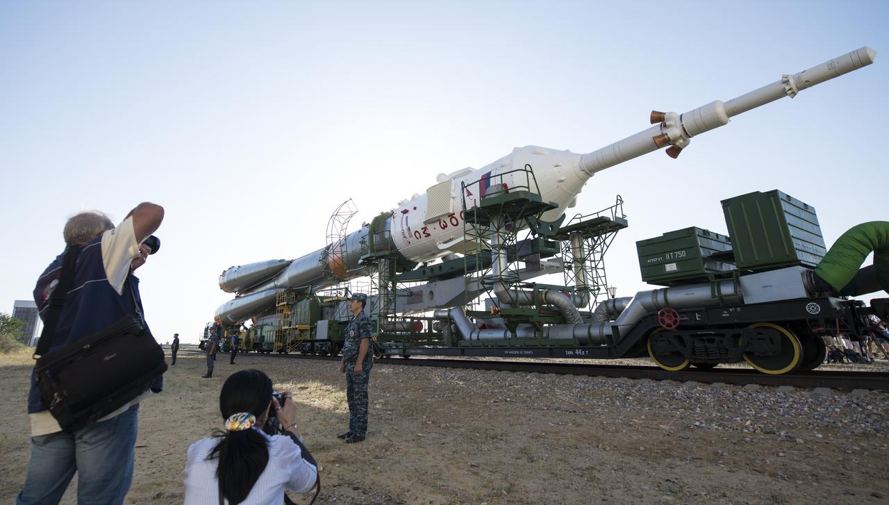 The Soyuz rocket is seen as it is rolled out to the launch pad by train, Thursday, July 18, 2019 at the Baikonur Cosmodrome in Kazakhstan. Expedition 60 Soyuz Commander Alexander Skvortsov of Roscosmos, flight engineer Andrew Morgan of NASA, and flight engineer Luca Parmitano of ESA (European Space Agency) are scheduled to launch aboard their Soyuz MS-13 spacecraft at 12:28 p.m. Eastern time (9:28 p.m. Baikonur time) , on Saturday, July 20. Photo Credit: (NASA/Joel Kowsky)