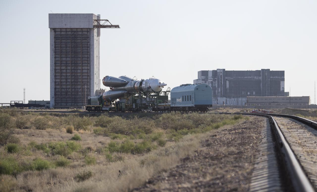 The Soyuz rocket is seen as it is rolled out to the launch pad by train, Thursday, July 18, 2019 at the Baikonur Cosmodrome in Kazakhstan. Expedition 60 Soyuz Commander Alexander Skvortsov of Roscosmos, flight engineer Andrew Morgan of NASA, and flight engineer Luca Parmitano of ESA (European Space Agency) are scheduled to launch aboard their Soyuz MS-13 spacecraft at 12:28 p.m. Eastern time (9:28 p.m. Baikonur time) , on Saturday, July 20. Photo Credit: (NASA/Joel Kowsky)