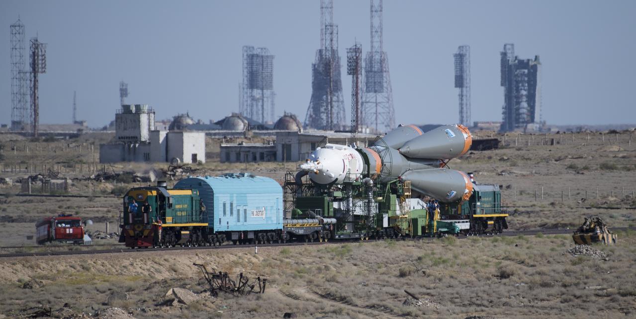 The Soyuz rocket is seen as it is transported to the launch pad by train, Thursday, July 18, 2019 at the Baikonur Cosmodrome in Kazakhstan. Expedition 60 Soyuz Commander Alexander Skvortsov of Roscosmos, flight engineer Andrew Morgan of NASA, and flight engineer Luca Parmitano of ESA (European Space Agency) are scheduled to launch aboard their Soyuz MS-13 spacecraft at 12:28 p.m. Eastern time (9:28 p.m. Baikonur time) , on Saturday, July 20. Photo Credit: (NASA/Joel Kowsky)