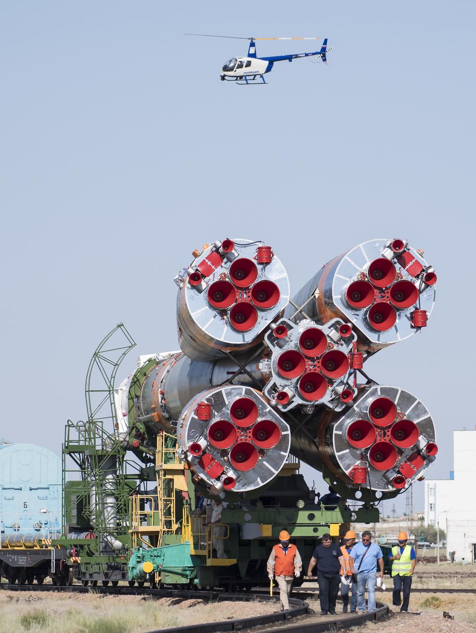 The Soyuz rocket is seen as it is transported to the launch pad by train, Thursday, July 18, 2019 at the Baikonur Cosmodrome in Kazakhstan. Expedition 60 Soyuz Commander Alexander Skvortsov of Roscosmos, flight engineer Andrew Morgan of NASA, and flight engineer Luca Parmitano of ESA (European Space Agency) are scheduled to launch aboard their Soyuz MS-13 spacecraft at 12:28 p.m. Eastern time (9:28 p.m. Baikonur time) , on Saturday, July 20. Photo Credit: (NASA/Joel Kowsky)