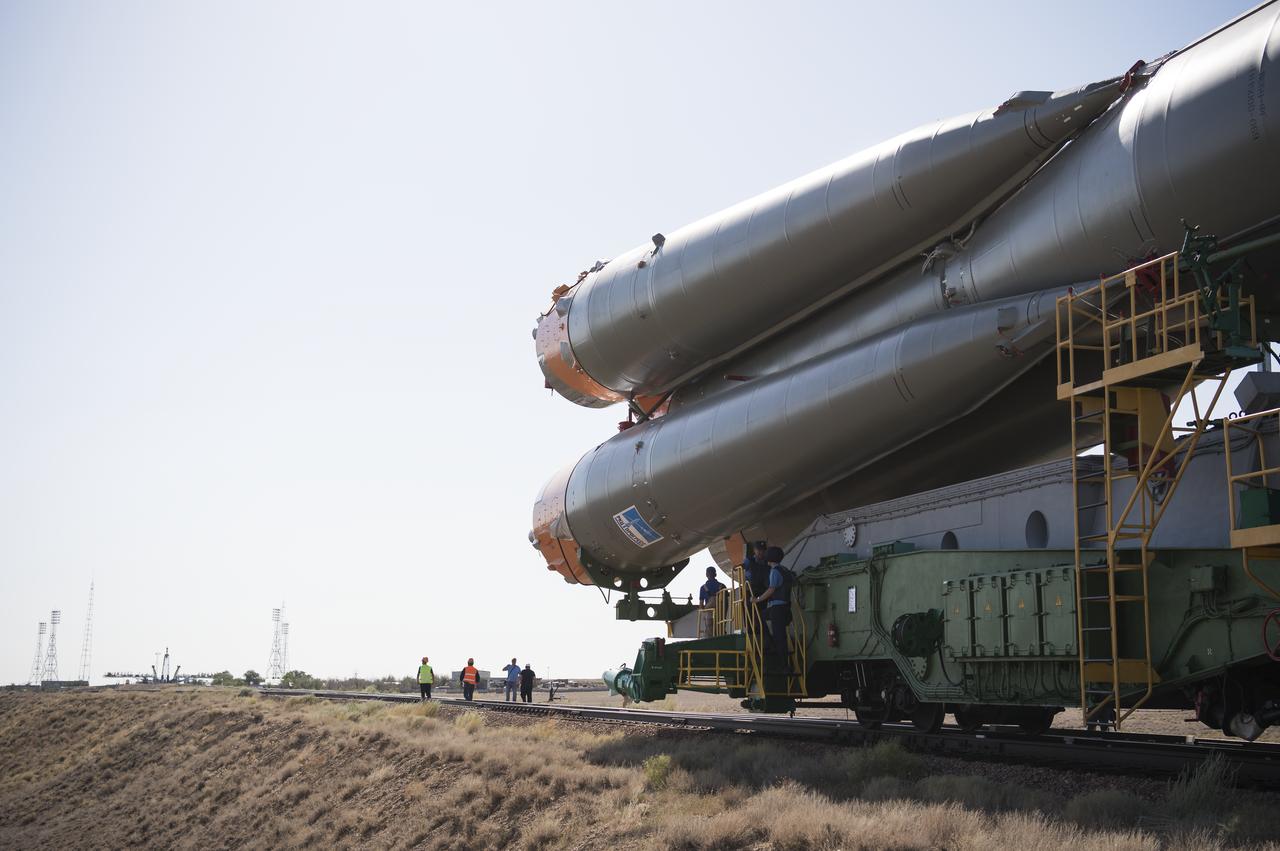 The Soyuz rocket is seen as it approaches the launch pad by train, Thursday, July 18, 2019 at the Baikonur Cosmodrome in Kazakhstan. Expedition 60 Soyuz Commander Alexander Skvortsov of Roscosmos, flight engineer Andrew Morgan of NASA, and flight engineer Luca Parmitano of ESA (European Space Agency) are scheduled to launch aboard their Soyuz MS-13 spacecraft at 12:28 p.m. Eastern time (9:28 p.m. Baikonur time) , on Saturday, July 20. Photo Credit: (NASA/Joel Kowsky)