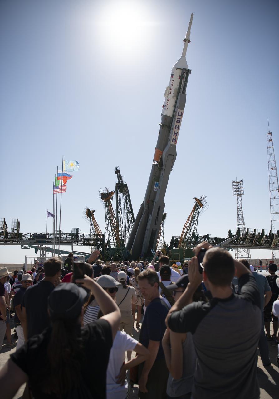 The Soyuz rocket is seen as it is raised into a vertical position on the launch pad, Thursday, July 18, 2019 at the Baikonur Cosmodrome in Kazakhstan. Expedition 60 Soyuz Commander Alexander Skvortsov of Roscosmos, flight engineer Andrew Morgan of NASA, and flight engineer Luca Parmitano of ESA (European Space Agency) are scheduled to launch aboard their Soyuz MS-13 spacecraft at 12:28 p.m. Eastern time (9:28 p.m. Baikonur time) , on Saturday, July 20. Photo Credit: (NASA/Joel Kowsky)
