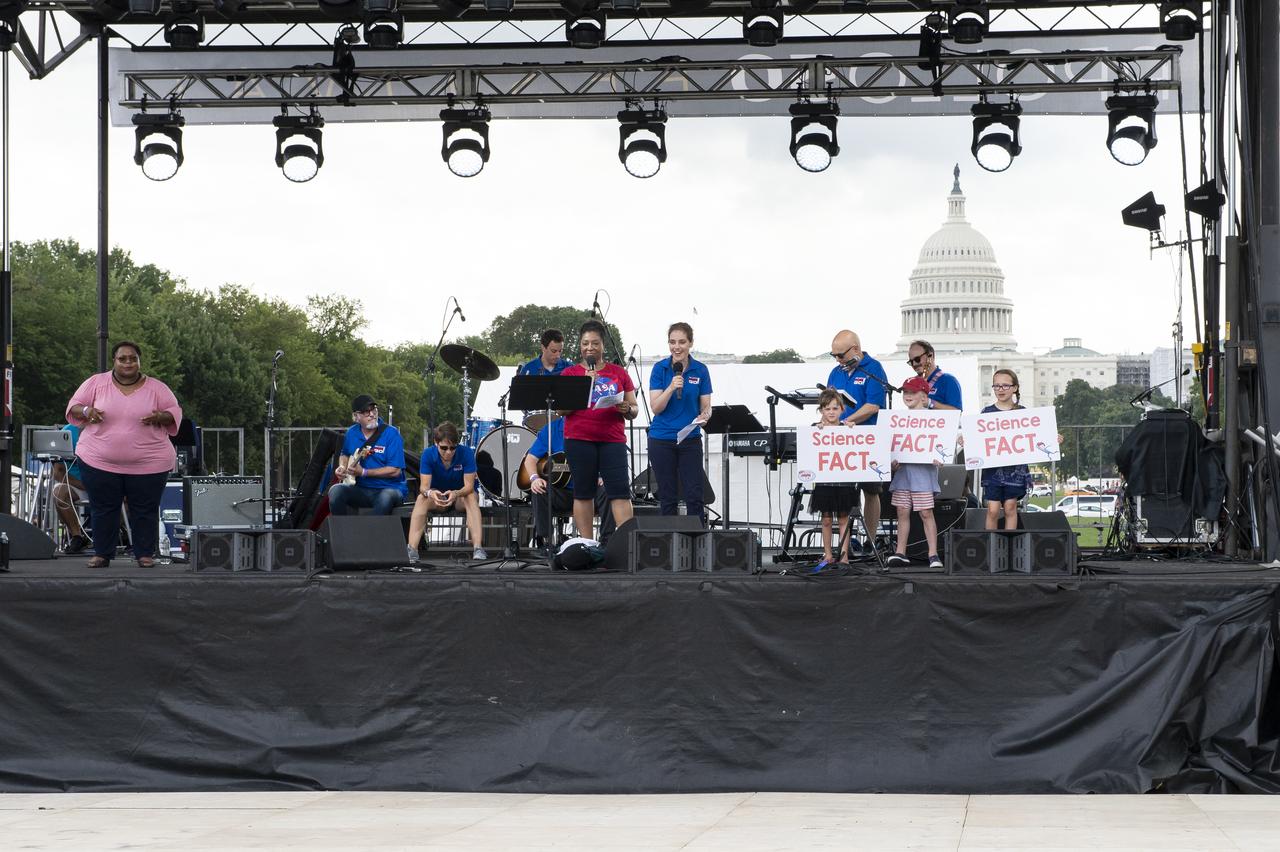 Christyl Johnson, NASA Goddard deputy director for technology and research investments, is seen on stage during a performance at the Apollo 11 50th Anniversary celebration on the National Mall, Thursday, July 18, 2019 in Washington. Apollo 11 was the first mission to land astronauts on the Moon and launched on July 16, 1969 with astronauts Neil Armstrong, Michael Collins, and Buzz Aldrin. Photo Credit: (NASA/Connie Moore)