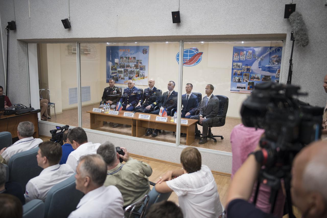 Expedition 60 prime crew members flight engineer Andrew Morgan of NASA, left, Soyuz Commander Alexander Skvortsov of Roscosmos, second from left, and flight engineer Luca Parmitano of ESA (European Space Agency), third from left, are seen with backup crew members Soichi Noguchi of the Japan Aerospace Exploration Agency (JAXA), third from right, Sergey Ryzhikov of Roscosmos, second from right, and Thomas Marshburn of NASA, right, during the State Commission meeting to approve the Soyuz launch of Expedition 60 to the International Space Station, Friday, July 19, 2019 at the Cosmonaut Hotel in Baikonur, Kazakhstan. Expedition 60 Soyuz Commander Alexander Skvortsov of Roscosmos, Andrew Morgan of NASA, and Luca Parmitano of ESA (European Space Agency) are scheduled to launch to the International Space Station aboard the Soyuz MS-13 spacecraft on Saturday, July 20.   Photo Credit: (NASA/Joel Kowsky)