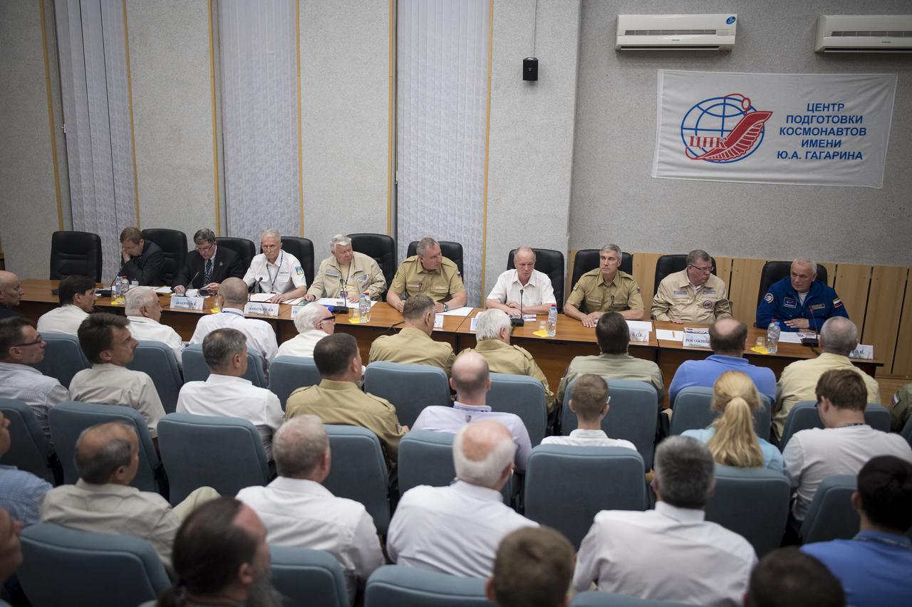 Members of the State Commission meet to approve the Soyuz launch of Expedition 60 to the International Space Station, Friday, July 19, 2019 at the Cosmonaut Hotel in Baikonur, Kazakhstan. Expedition 60 Soyuz Commander Alexander Skvortsov of Roscosmos, Andrew Morgan of NASA, and Luca Parmitano of ESA (European Space Agency) are scheduled to launch to the International Space Station aboard the Soyuz MS-13 spacecraft on Saturday, July 20. Photo Credit: (NASA/Joel Kowsky)