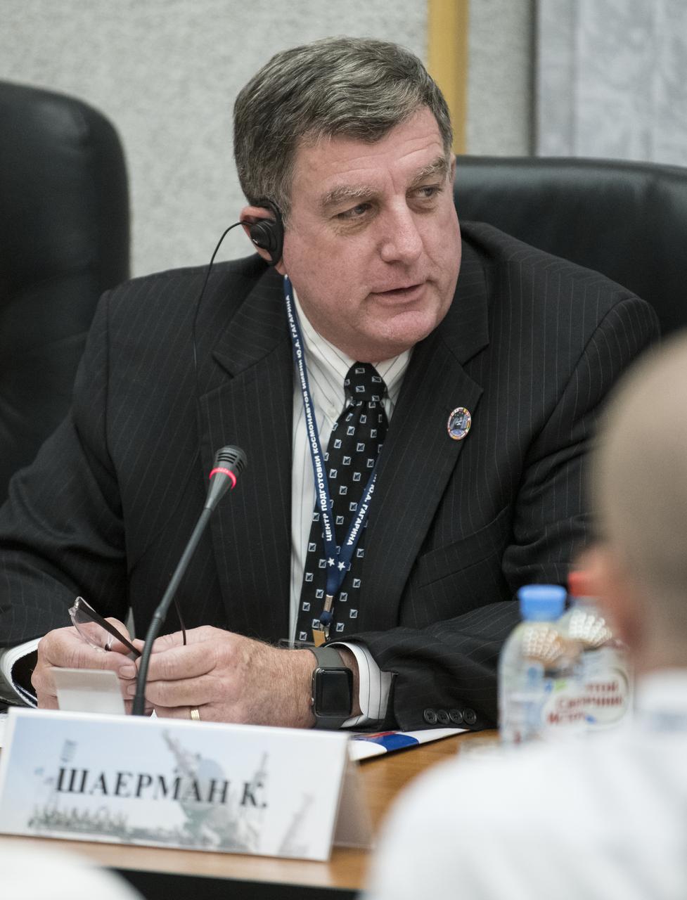 NASA International Space Station Program Manager Kirk Shireman is seen during the State Commission meeting to approve the Soyuz launch of Expedition 60 to the International Space Station, Friday, July 19, 2019 at the Cosmonaut Hotel in Baikonur, Kazakhstan. Expedition 60 Soyuz Commander Alexander Skvortsov of Roscosmos, Andrew Morgan of NASA, and Luca Parmitano of ESA (European Space Agency) are scheduled to launch to the International Space Station aboard the Soyuz MS-13 spacecraft on Saturday, July 20. Photo Credit: (NASA/Joel Kowsky)