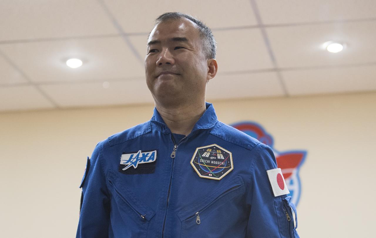 Expedition 60 backup crew member of the Japan Aerospace Exploration Agency (JAXA) is introduced during a press conference, Friday, July 19, 2019 at the Cosmonaut Hotel in Baikonur, Kazakhstan. Expedition 60 Soyuz Commander Alexander Skvortsov of Roscosmos, flight engineer Andrew Morgan of NASA, and flight engineer Luca Parmitano of ESA (European Space Agency) are scheduled to launch to the International Space Station aboard the Soyuz MS-13 spacecraft at 12:28 p.m. Eastern time (9:28 p.m. Baikonur time) on Saturday, July 20. Photo Credit: (NASA/Joel Kowsky)