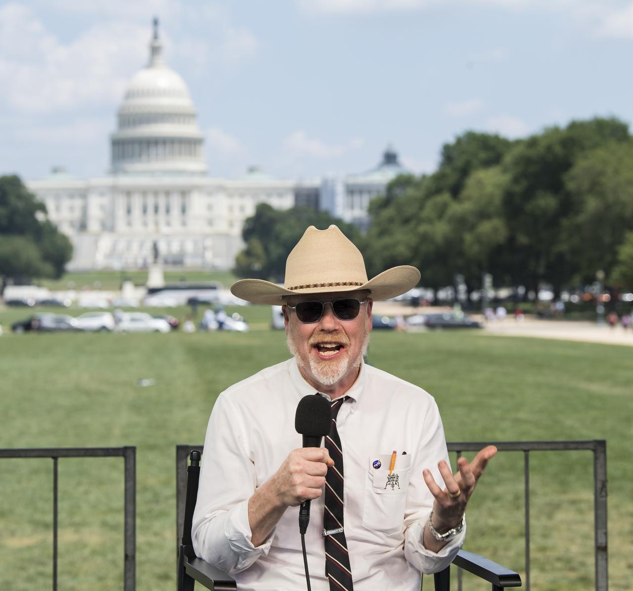 Adam Savage, maker and host of Savage Builds, speaks during “NASA’s Giant Leaps: Past and Future," a live television program on Friday, July 19, 2019 on the National Mall in Washington. NASA and the world are recognizing the 50th anniversary of Apollo 11, in which astronauts Neil Armstrong, Michael Collins, and Buzz Aldrin crewed the first mission to land astronauts on the Moon. Photo Credit: (NASA/Aubrey Gemignani)