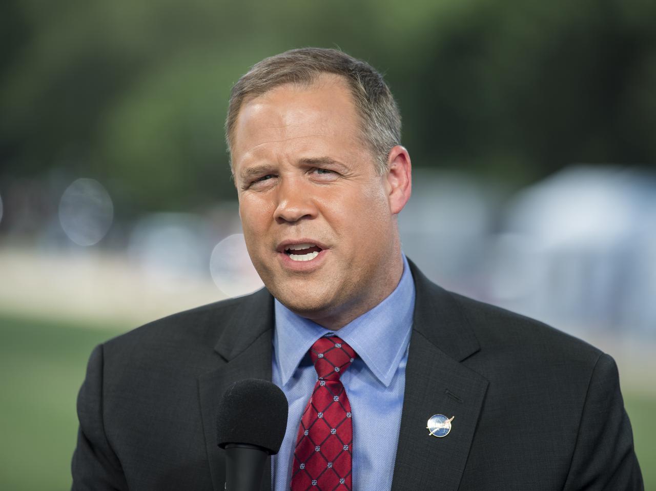 NASA Administrator, Jim Bridenstine, speaks during “NASA’s Giant Leaps: Past and Future," a live television program on Friday, July 19, 2019 on the National Mall in Washington. NASA and the world are recognizing the 50th anniversary of Apollo 11, in which astronauts Neil Armstrong, Michael Collins, and Buzz Aldrin crewed the first mission to land astronauts on the Moon. Photo Credit: (NASA/Aubrey Gemignani)