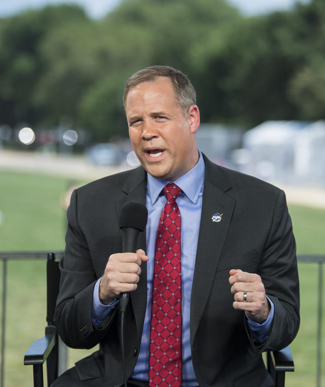 NASA Administrator, Jim Bridenstine, speaks during “NASA’s Giant Leaps: Past and Future," a live television program on Friday, July 19, 2019 on the National Mall in Washington. NASA and the world are recognizing the 50th anniversary of Apollo 11, in which astronauts Neil Armstrong, Michael Collins, and Buzz Aldrin crewed the first mission to land astronauts on the Moon. Photo Credit: (NASA/Aubrey Gemignani)