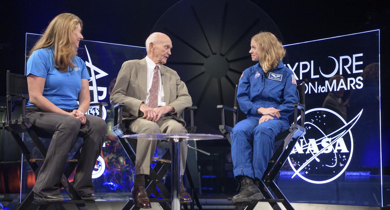 NASA Public Affairs Officer for Heliophysics Karen Fox, left, interviews, Apollo 11 astronaut Mike Collins, and NASA astronaut candidate Zena Cardman during “NASA’s Giant Leaps: Past and Future," a live television program on Friday, July 19, 2019 from the Smithsonian National Air and Space Museum in Washington. NASA and the world are recognizing the 50th anniversary of Apollo 11, in which astronauts Neil Armstrong, Michael Collins, and Buzz Aldrin crewed the first mission to land astronauts on the Moon. Photo Credit: (NASA/Bill Ingalls)