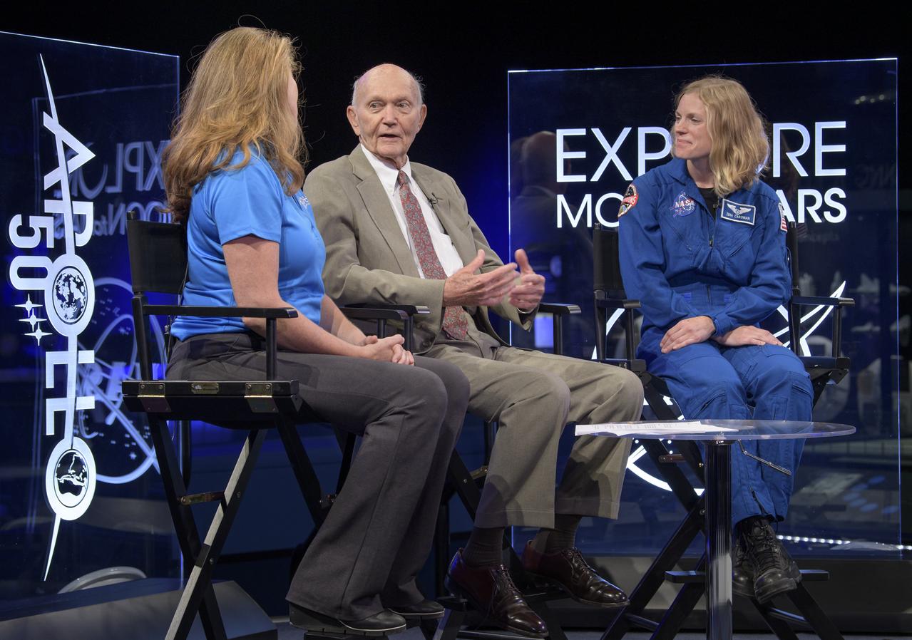 NASA Public Affairs Officer for Heliophysics Karen Fox, left, interviews, Apollo 11 astronaut Mike Collins, and NASA astronaut candidate Zena Cardman during “NASA’s Giant Leaps: Past and Future," a live television program on Friday, July 19, 2019 from the Smithsonian National Air and Space Museum in Washington. NASA and the world are recognizing the 50th anniversary of Apollo 11, in which astronauts Neil Armstrong, Michael Collins, and Buzz Aldrin crewed the first mission to land astronauts on the Moon. Photo Credit: (NASA/Bill Ingalls)