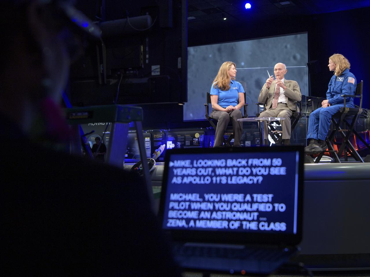 NASA Public Affairs Officer for Heliophysics Karen Fox, left, interviews, Apollo 11 astronaut Mike Collins, and NASA astronaut candidate Zena Cardman during “NASA’s Giant Leaps: Past and Future," a live television program on Friday, July 19, 2019 from the Smithsonian National Air and Space Museum in Washington. NASA and the world are recognizing the 50th anniversary of Apollo 11, in which astronauts Neil Armstrong, Michael Collins, and Buzz Aldrin crewed the first mission to land astronauts on the Moon. Photo Credit: (NASA/Bill Ingalls)