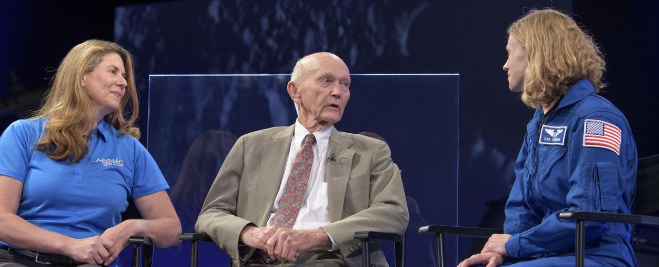 NASA Public Affairs Officer for Heliophysics Karen Fox, left, interviews, Apollo 11 astronaut Mike Collins, and NASA astronaut candidate Zena Cardman during “NASA’s Giant Leaps: Past and Future," a live television program on Friday, July 19, 2019 from the Smithsonian National Air and Space Museum in Washington. NASA and the world are recognizing the 50th anniversary of Apollo 11, in which astronauts Neil Armstrong, Michael Collins, and Buzz Aldrin crewed the first mission to land astronauts on the Moon. Photo Credit: (NASA/Bill Ingalls)