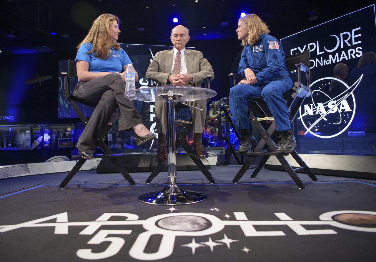 NASA Public Affairs Officer for Heliophysics Karen Fox, left, interviews, Apollo 11 astronaut Mike Collins, and NASA astronaut candidate Zena Cardman during “NASA’s Giant Leaps: Past and Future," a live television program on Friday, July 19, 2019 from the Smithsonian National Air and Space Museum in Washington. NASA and the world are recognizing the 50th anniversary of Apollo 11, in which astronauts Neil Armstrong, Michael Collins, and Buzz Aldrin crewed the first mission to land astronauts on the Moon. Photo Credit: (NASA/Bill Ingalls)