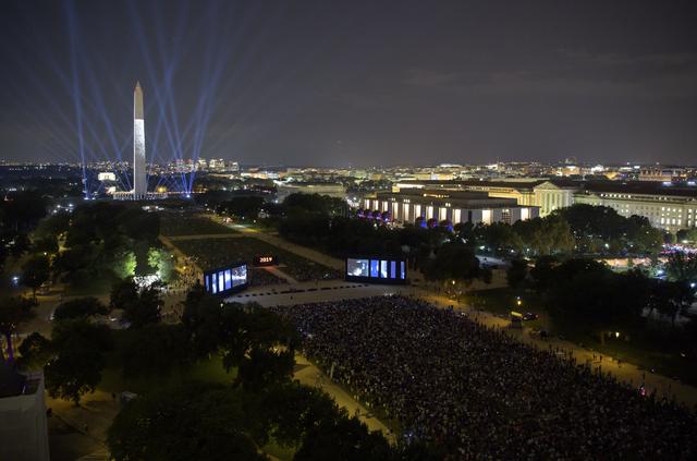 NASA image: Apollo 11 Saturn V Rocket Projected On The Washington Monument