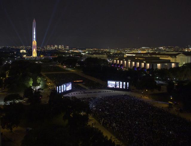 NASA image: Apollo 11 Saturn V Rocket Projected On The Washington Monument