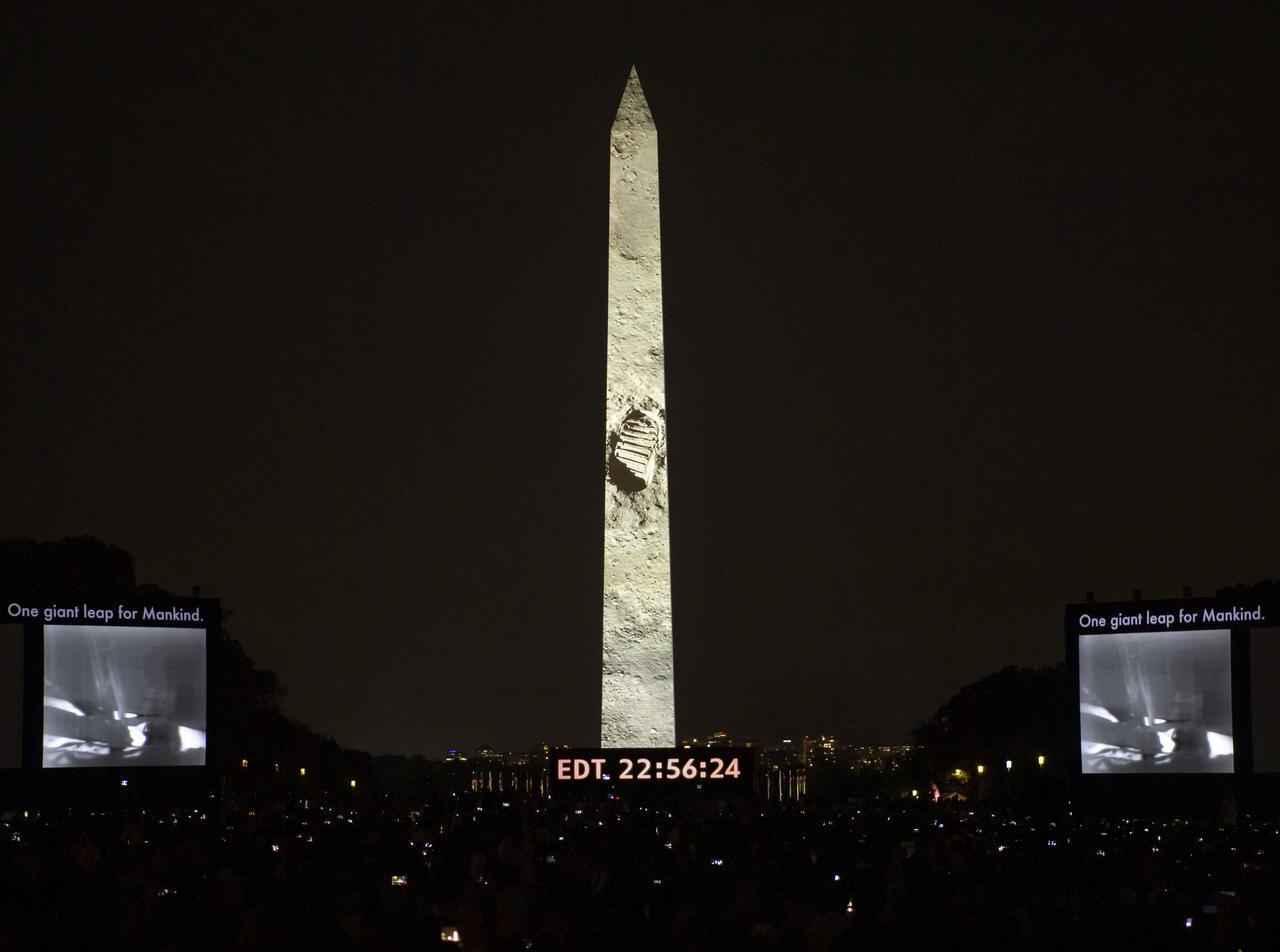 The 50 year anniversary of the Apollo 11 mission with NASA astronauts Neil Armstrong, Michael Collins, and Buzz Aldrin is celebrated in a 17-minute show, “Apollo 50: Go for the Moon”, by the Smithsonian’s National Air and Space Museum, which combined full-motion projection-mapping artwork on the Washington Monument and archival footage to recreate the launch of Apollo 11 and tell the story of the first moon landing, Friday, July 19, 2019 in Washington. Photo Credit: (NASA/Bill Ingalls)