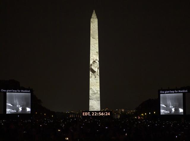 NASA image: Apollo 11 Saturn V Rocket Projected On The Washington Monument