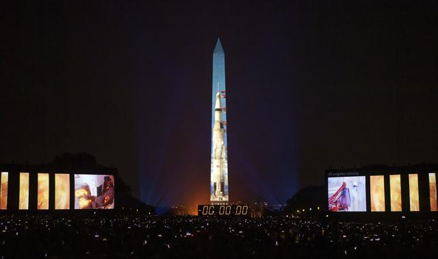 NASA image: Apollo 11 Saturn V Rocket Projected On The Washington Monument