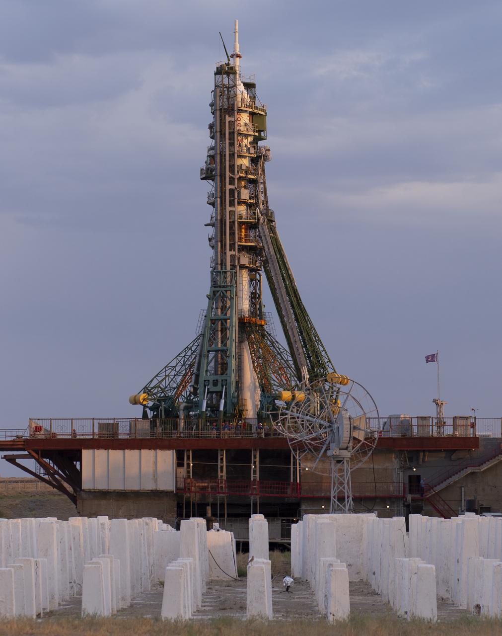 The Soyuz rocket with Soyuz MS-13 spacecraft onboard is seen on the launch pad after the arrival of Expedition 60 flight engineer Luca Parmitano of ESA (European Space Agency), flight engineer Andrew Morgan of NASA, and Soyuz Commander Alexander Skvortsov of Roscosmos, Saturday, July 20, 2019 at the Baikonur Cosmodrome in Kazakhstan. Parmitano, Morgan, and Skvortsov launched at 12:28 p.m. Eastern time (9:28 p.m. Baikonur time). Photo Credit: (NASA/Joel Kowsky)
