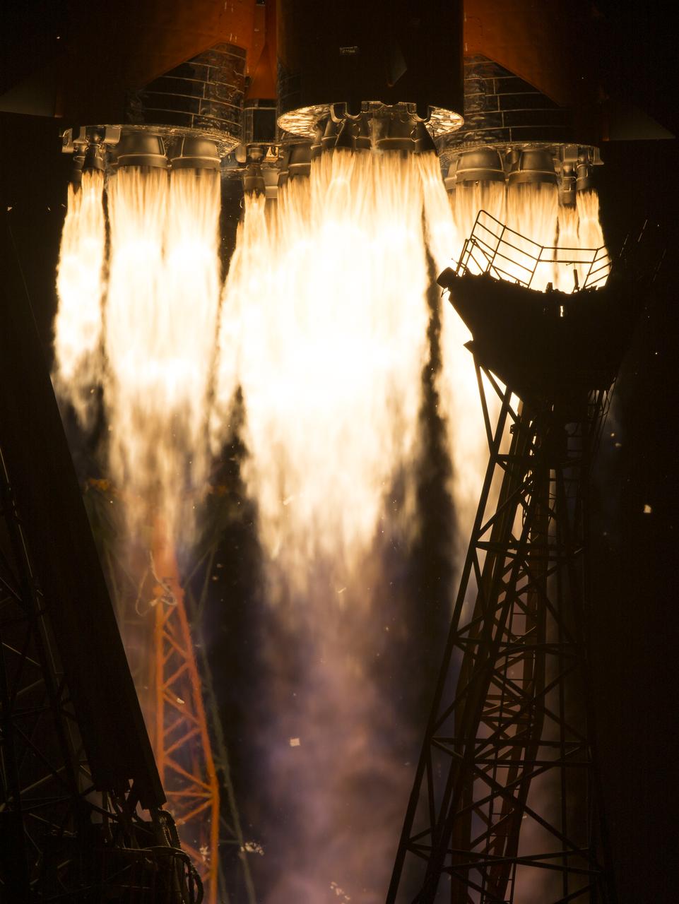 The Soyuz MS-13 rocket is launched with Expedition 60 Soyuz Commander Alexander Skvortsov of Roscosmos, flight engineer Andrew Morgan of NASA, and flight engineer Luca Parmitano of ESA (European Space Agency), Saturday, July 20, 2019 at the Baikonur Cosmodrome in Kazakhstan. Skvortsov, Morgan, and Parmitano launched at 12:28 p.m. Eastern time (9:28 p.m. Baikonur time) to begin their mission to the International Space Station. Photo Credit: (NASA/Joel Kowsky)
