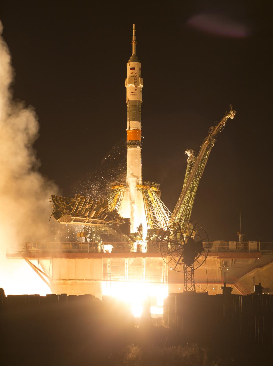 The Soyuz MS-13 rocket is launched with Expedition 60 Soyuz Commander Alexander Skvortsov of Roscosmos, flight engineer Andrew Morgan of NASA, and flight engineer Luca Parmitano of ESA (European Space Agency), Saturday, July 20, 2019 at the Baikonur Cosmodrome in Kazakhstan. Skvortsov, Morgan, and Parmitano launched at 12:28 p.m. Eastern time (9:28 p.m. Baikonur time) to begin their mission to the International Space Station. Photo Credit: (NASA/Joel Kowsky)