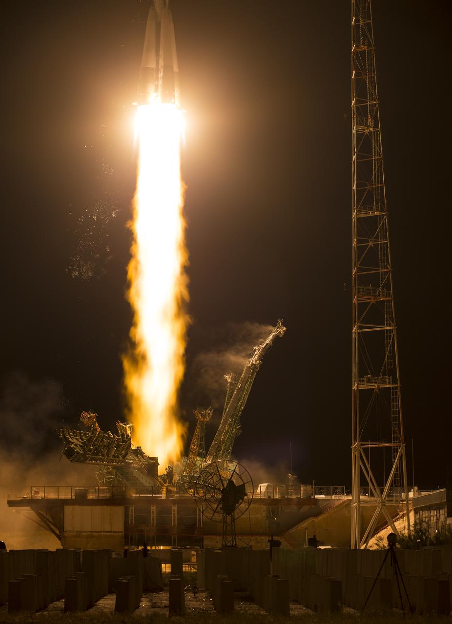 The Soyuz MS-13 rocket is launched with Expedition 60 Soyuz Commander Alexander Skvortsov of Roscosmos, flight engineer Andrew Morgan of NASA, and flight engineer Luca Parmitano of ESA (European Space Agency), Saturday, July 20, 2019 at the Baikonur Cosmodrome in Kazakhstan. Skvortsov, Morgan, and Parmitano launched at 12:28 p.m. Eastern time (9:28 p.m. Baikonur time) to begin their mission to the International Space Station. Photo Credit: (NASA/Joel Kowsky)