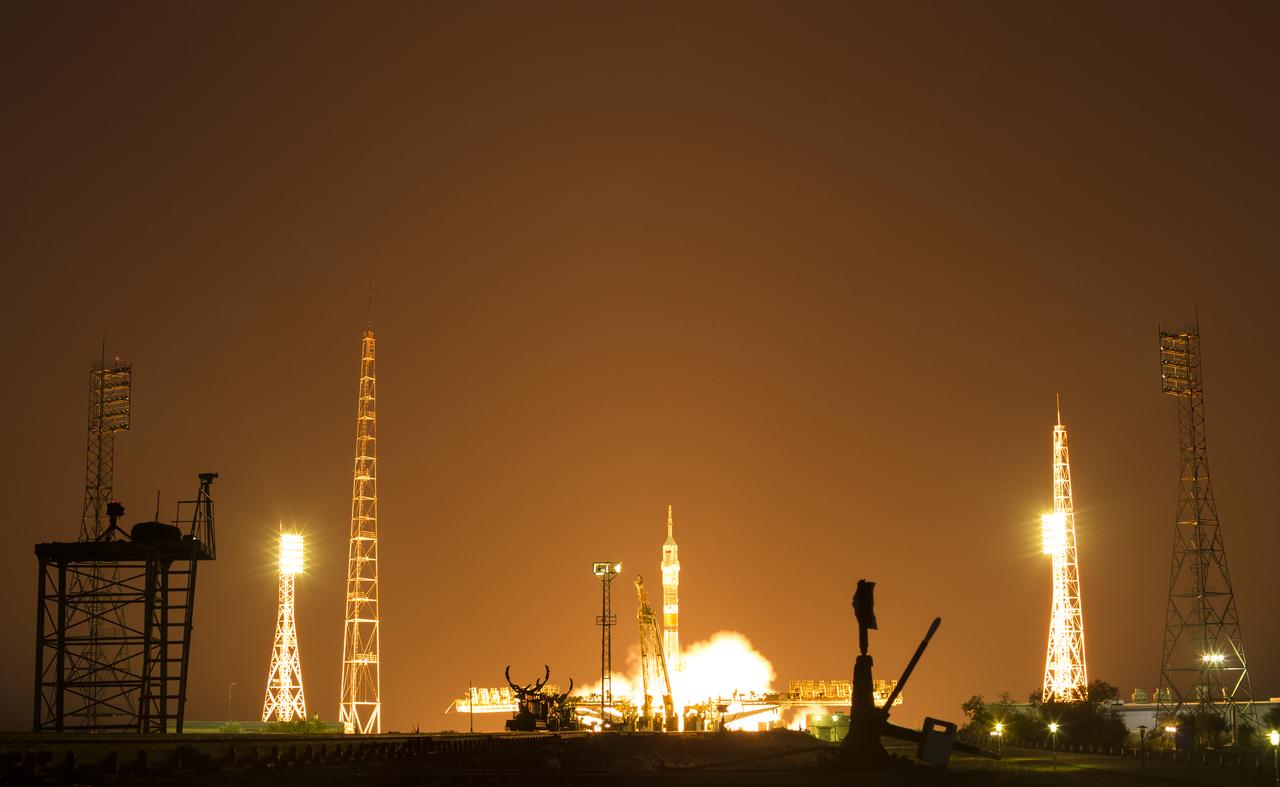 The Soyuz MS-13 rocket is launched with Expedition 60 Soyuz Commander Alexander Skvortsov of Roscosmos, flight engineer Andrew Morgan of NASA, and flight engineer Luca Parmitano of ESA (European Space Agency), Saturday, July 20, 2019 at the Baikonur Cosmodrome in Kazakhstan. Skvortsov, Morgan, and Parmitano launched at 12:28 p.m. Eastern time (9:28 p.m. Baikonur time) to begin their mission to the International Space Station. Photo Credit: (NASA/Joel Kowsky)