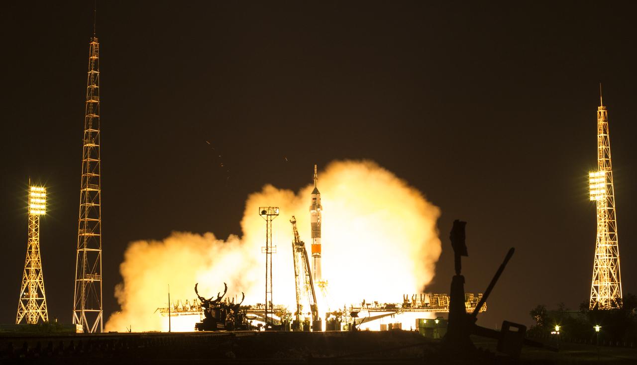 The Soyuz MS-13 rocket is launched with Expedition 60 Soyuz Commander Alexander Skvortsov of Roscosmos, flight engineer Andrew Morgan of NASA, and flight engineer Luca Parmitano of ESA (European Space Agency), Saturday, July 20, 2019 at the Baikonur Cosmodrome in Kazakhstan. Skvortsov, Morgan, and Parmitano launched at 12:28 p.m. Eastern time (9:28 p.m. Baikonur time) to begin their mission to the International Space Station. Photo Credit: (NASA/Joel Kowsky)