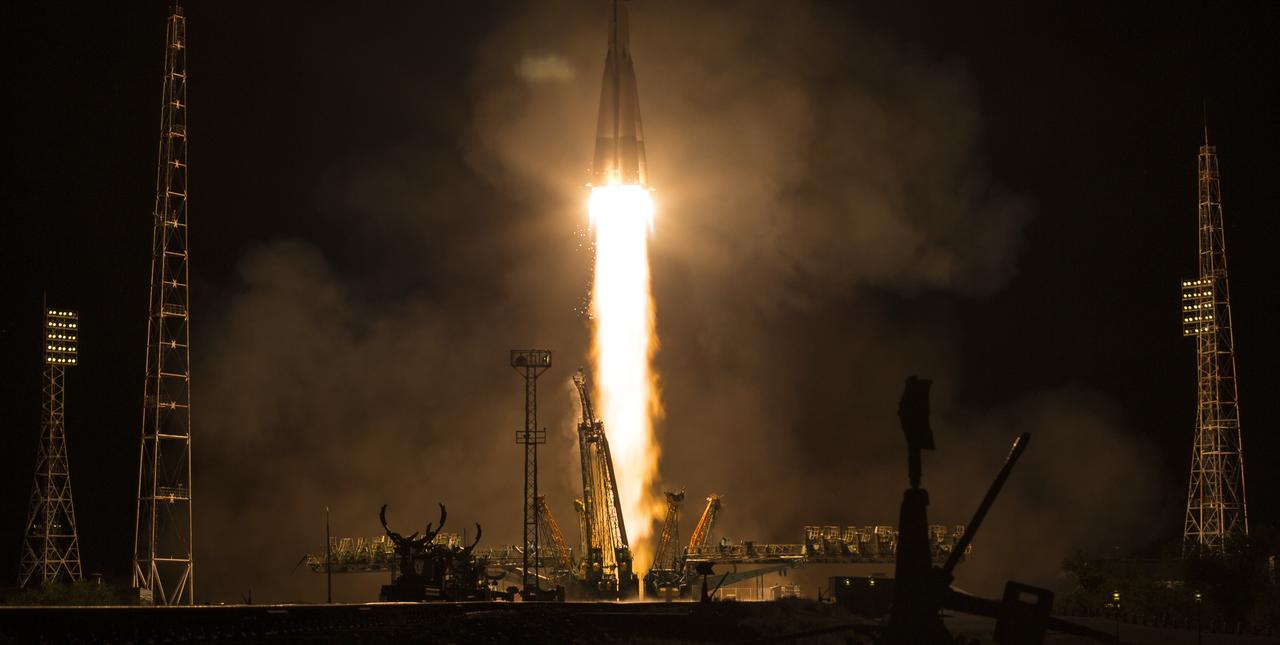 The Soyuz MS-13 rocket is launched with Expedition 60 Soyuz Commander Alexander Skvortsov of Roscosmos, flight engineer Andrew Morgan of NASA, and flight engineer Luca Parmitano of ESA (European Space Agency), Saturday, July 20, 2019 at the Baikonur Cosmodrome in Kazakhstan. Skvortsov, Morgan, and Parmitano launched at 12:28 p.m. Eastern time (9:28 p.m. Baikonur time) to begin their mission to the International Space Station. Photo Credit: (NASA/Joel Kowsky)