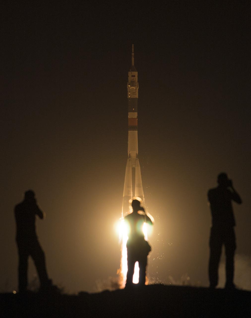 The Soyuz MS-13 rocket is launched with Expedition 60 Soyuz Commander Alexander Skvortsov of Roscosmos, flight engineer Andrew Morgan of NASA, and flight engineer Luca Parmitano of ESA (European Space Agency), Saturday, July 20, 2019 at the Baikonur Cosmodrome in Kazakhstan. Skvortsov, Morgan, and Parmitano launched at 12:28 p.m. Eastern time (9:28 p.m. Baikonur time) to begin their mission to the International Space Station. Photo Credit: (NASA/Joel Kowsky)