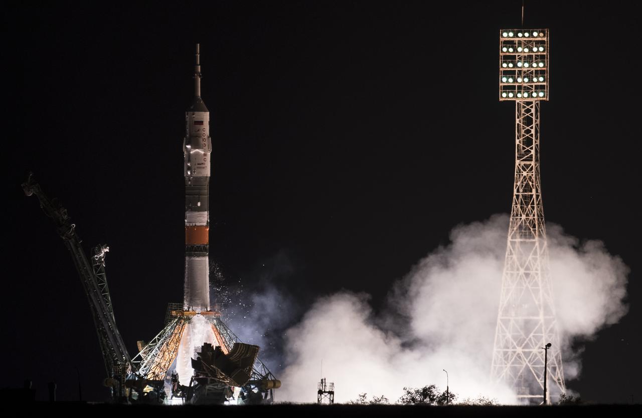 The Soyuz MS-13 rocket is launched with Expedition 60 Soyuz Commander Alexander Skvortsov of Roscosmos, flight engineer Andrew Morgan of NASA, and flight engineer Luca Parmitano of ESA (European Space Agency), Saturday, July 20, 2019 at the Baikonur Cosmodrome in Kazakhstan. Skvortsov, Morgan, and Parmitano launched at 12:28 p.m. Eastern time (9:28 p.m. Baikonur time) to begin their mission to the International Space Station. Photo Credit: (NASA/Joel Kowsky)