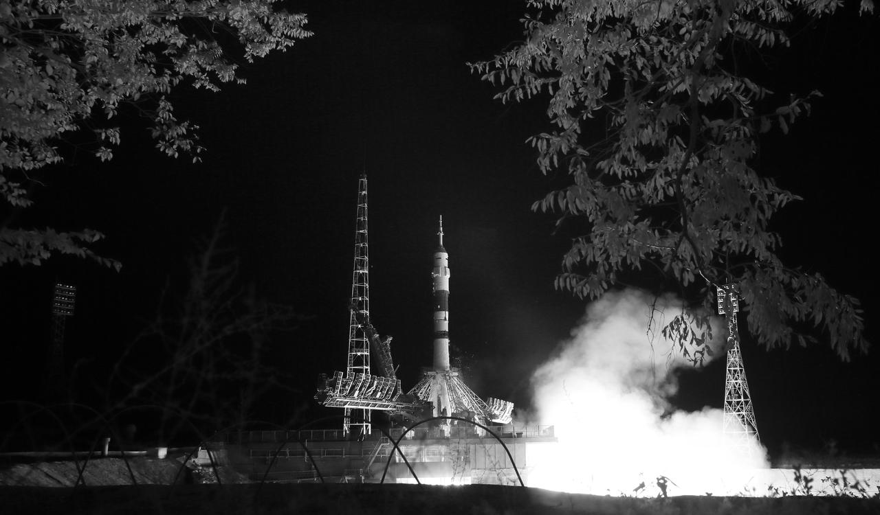 In this black and white infrared image, the Soyuz MS-13 rocket is launched with Expedition 60 Soyuz Commander Alexander Skvortsov of Roscosmos, flight engineer Andrew Morgan of NASA, and flight engineer Luca Parmitano of ESA (European Space Agency), Saturday, July 20, 2019 at the Baikonur Cosmodrome in Kazakhstan. Skvortsov, Morgan, and Parmitano launched at 12:28 p.m. Eastern time (9:28 p.m. Baikonur time) to begin their mission to the International Space Station. Photo Credit: (NASA/Joel Kowsky)