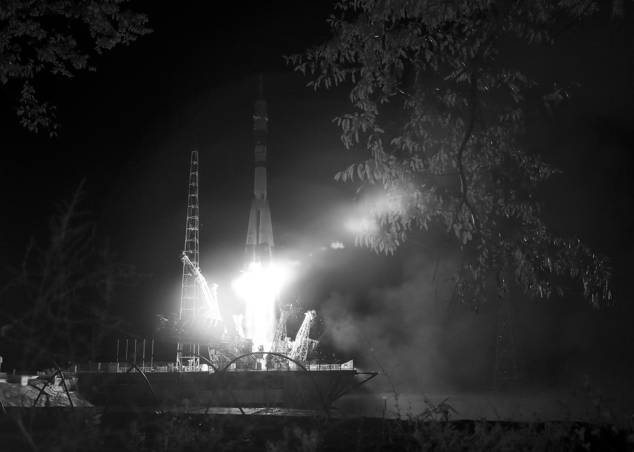 In this black and white infrared image, the Soyuz MS-13 rocket is launched with Expedition 60 Soyuz Commander Alexander Skvortsov of Roscosmos, flight engineer Andrew Morgan of NASA, and flight engineer Luca Parmitano of ESA (European Space Agency), Saturday, July 20, 2019 at the Baikonur Cosmodrome in Kazakhstan. Skvortsov, Morgan, and Parmitano launched at 12:28 p.m. Eastern time (9:28 p.m. Baikonur time) to begin their mission to the International Space Station. Photo Credit: (NASA/Joel Kowsky)