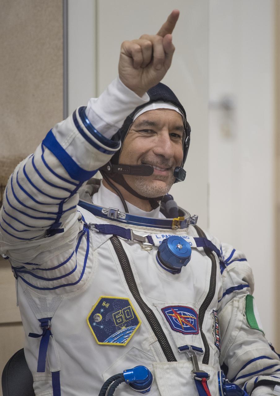 Expedition 60 flight engineer Luca Parmitano of ESA (European Space Agency) is seen as he waits to have his Russian Sokol suit pressure checked in preparation for launch aboard the Soyuz MS-13 spacecraft, Saturday, July 20, 2019 at the Baikonur Cosmodrome in Kazakhstan. Parmitano, Alexander Skvortsov of Roscosmos, and Andrew Morgan of NASA launched aboard the Soyuz MS-13 spacecraft at 12:28 p.m. Eastern time (9:28 p.m. Baikonur time) on July 20 to begin their journey to the International Space Station. Photo Credit: (NASA/Joel Kowsky)